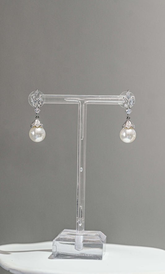 Cubic Zirconia bridal drop earrings with pearl detail.