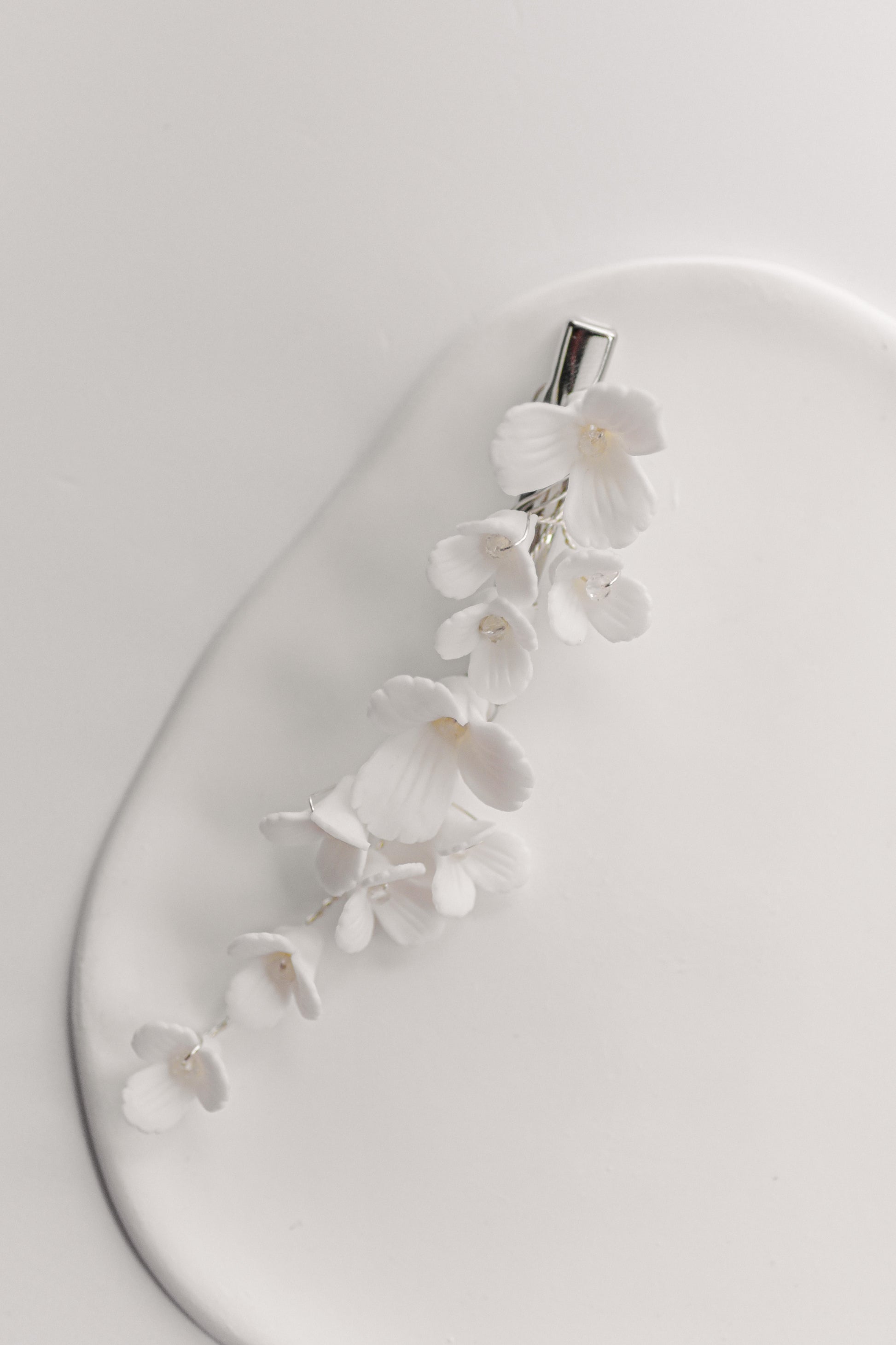 Silver bridal hair clip with porcelain flowers