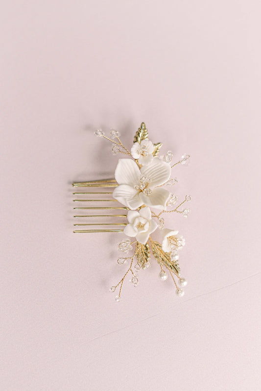 Gold bridal hair comb with porcelain flowers