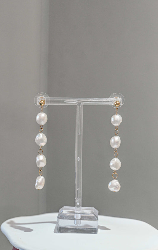 Bridal earrings with a string of fresh water pearls