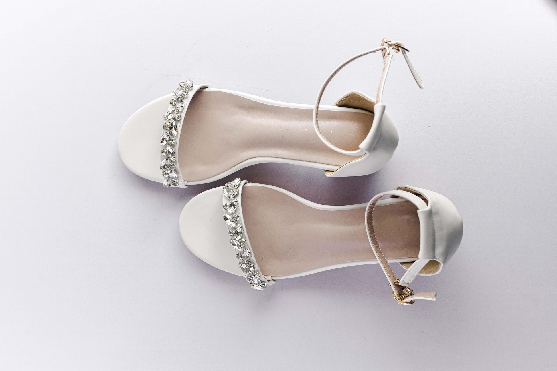 Ivory bridal shoes with rhinestone embellishments