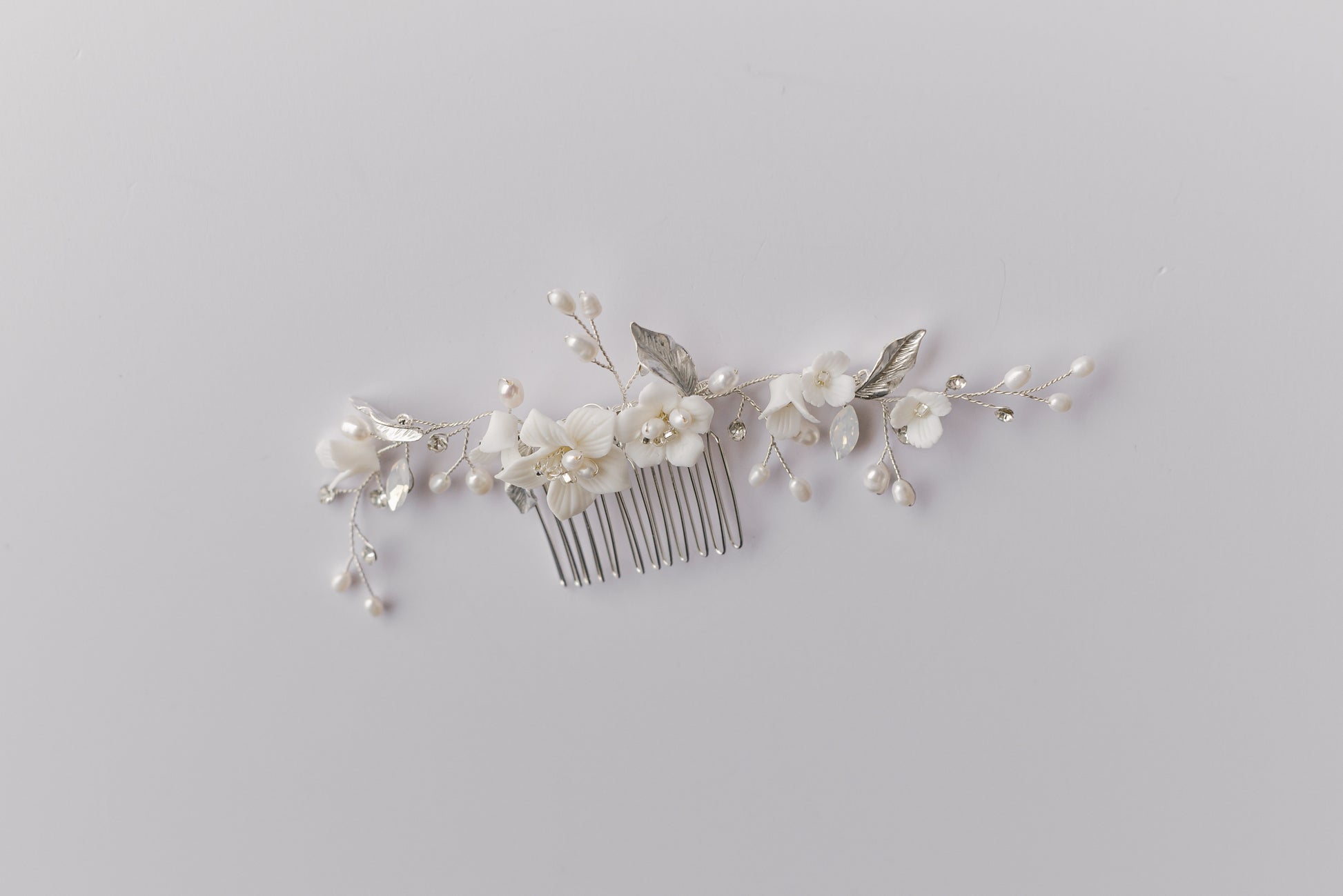 Silver bridal hair comb with porcelain flowers and fresh water pearls