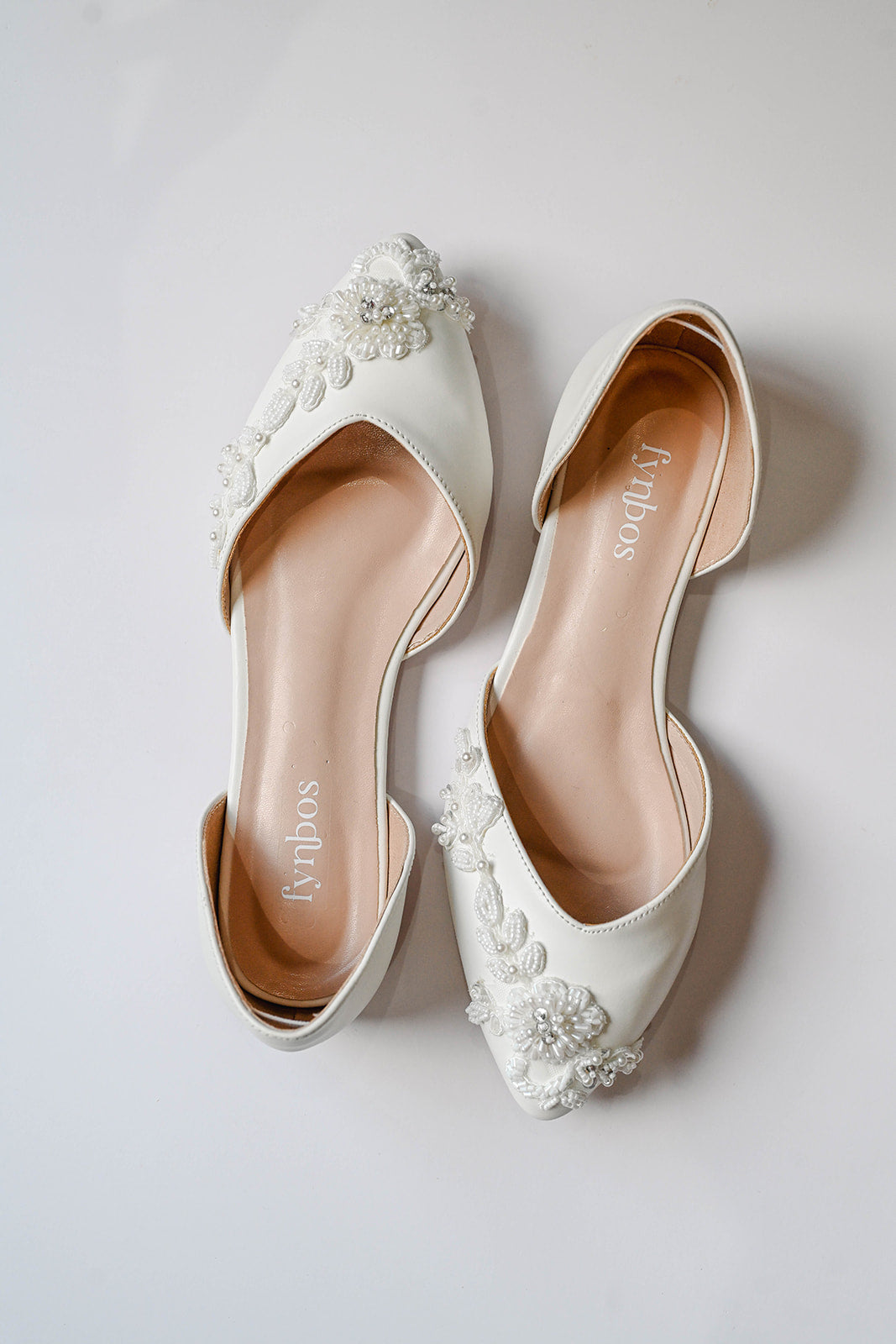 Ivory bridal flats with beaded lace decoration