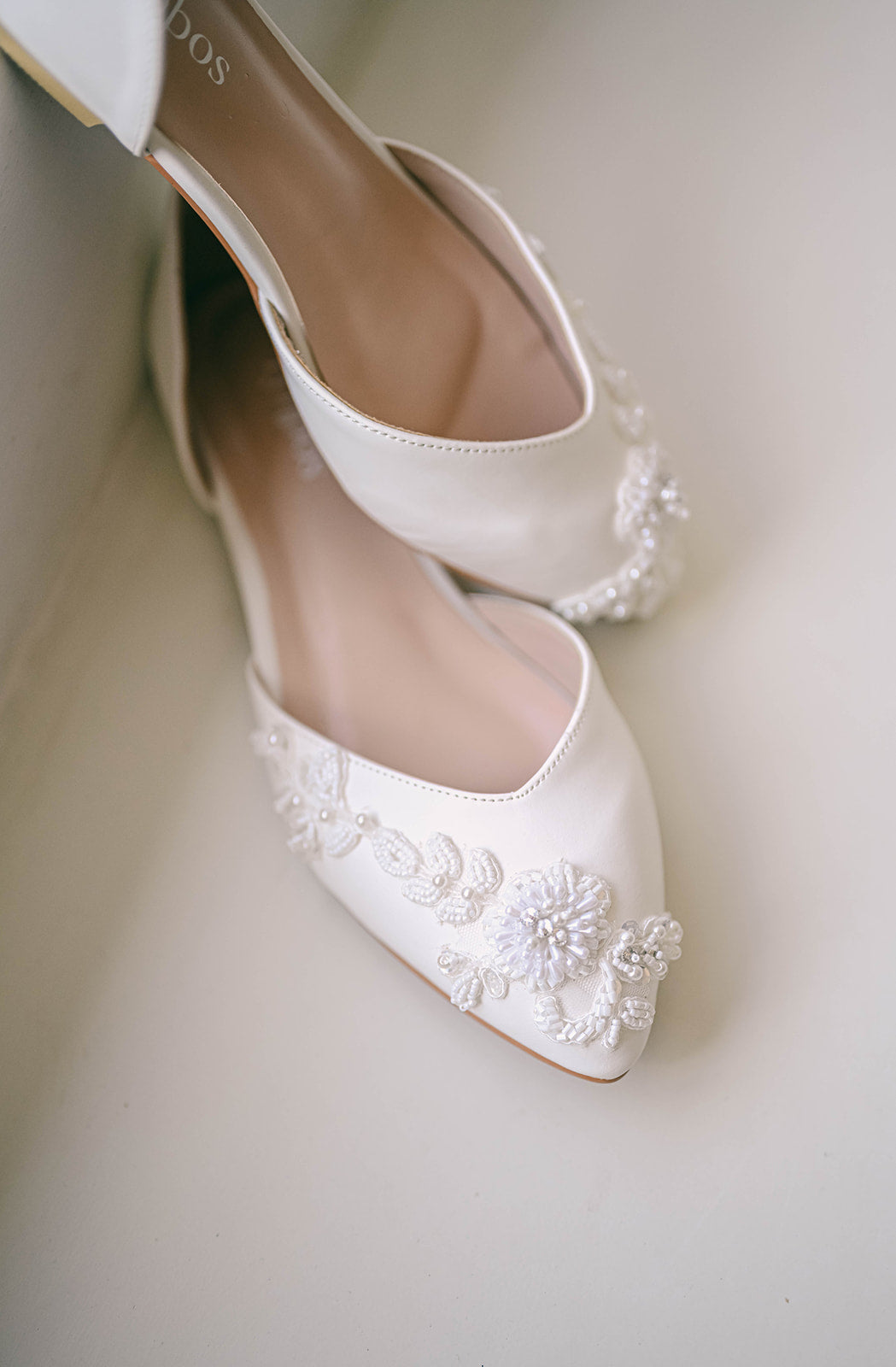 Ivory bridal flats with beaded lace decoration