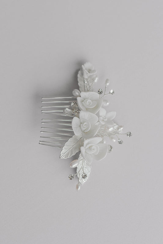 Silver bridal hair comb with porcelain flowers and leaf detail