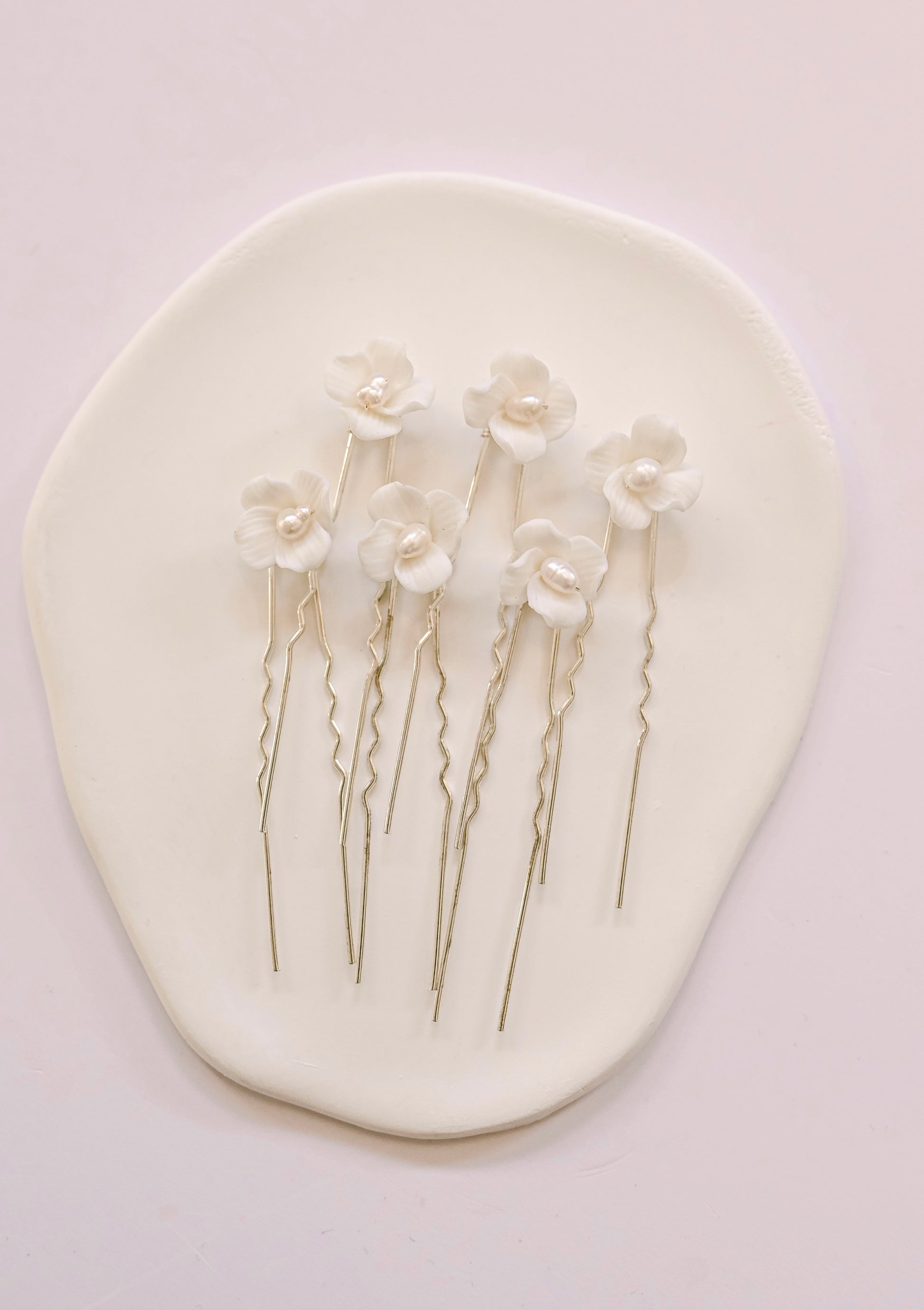 Silver bridal hair pins with porcelain flowers and fresh water pearls