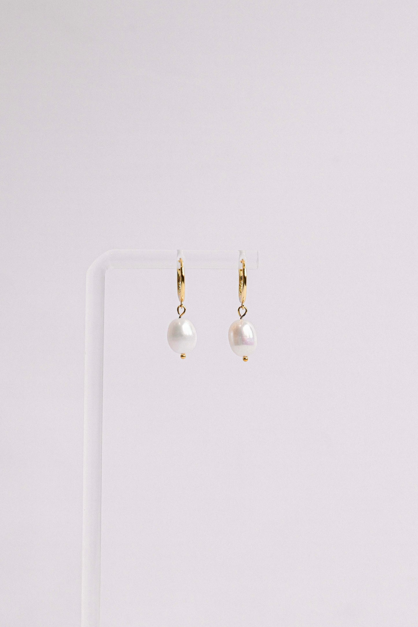 Sterling silver hoop earring with a freshwater pearl