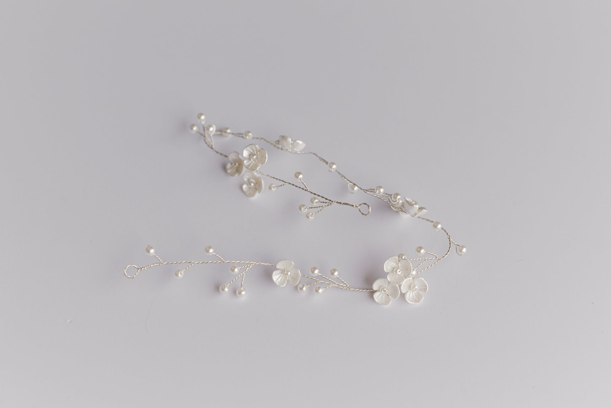 Silver bridal hair vine with flowers and pearls