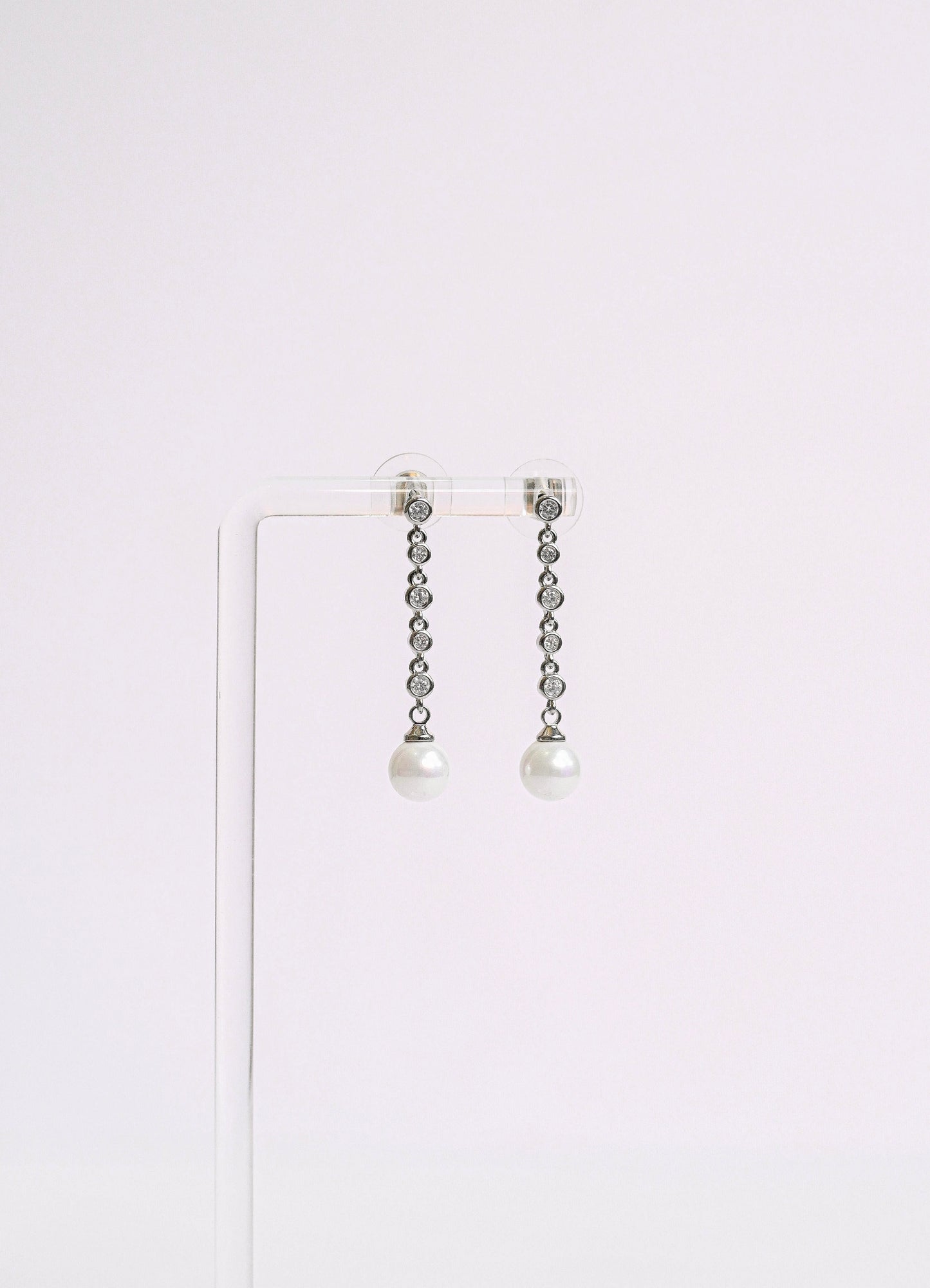 Dainty cubic zirconia bridal drop earring with a faux pearl