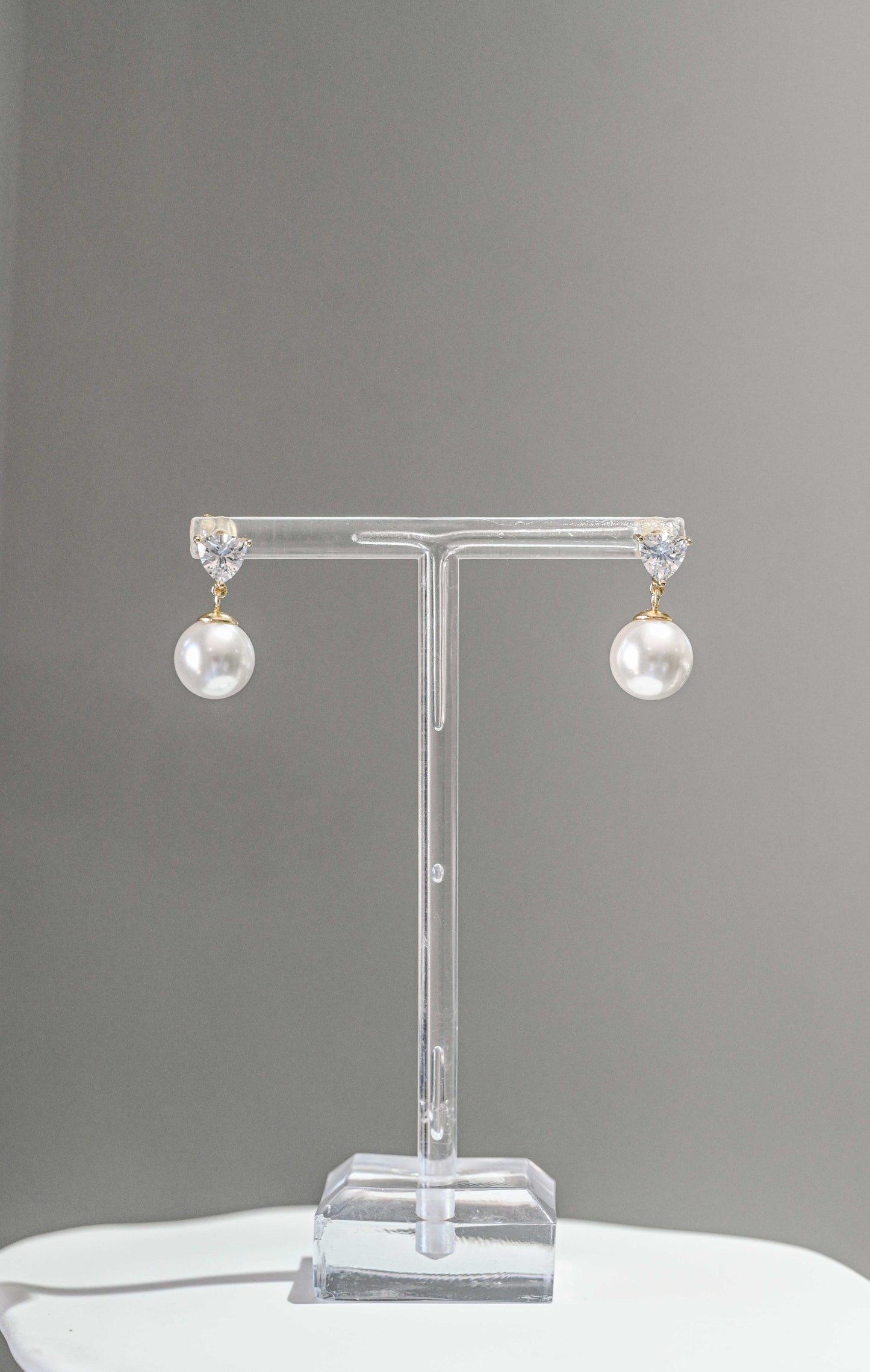 Sterling silver gold plated cubic zirconia earring with a drop pearl