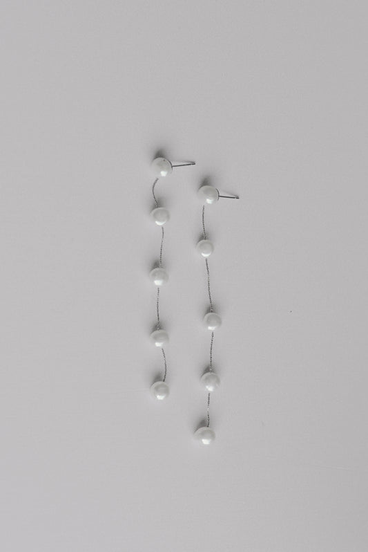 Silver string of 5 fresh water pearl earrings