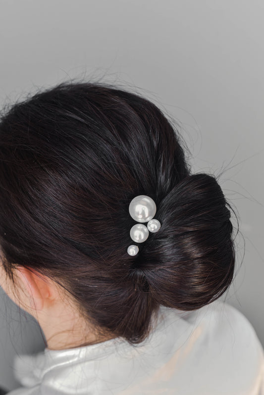 Pearl pins in a bridal updo