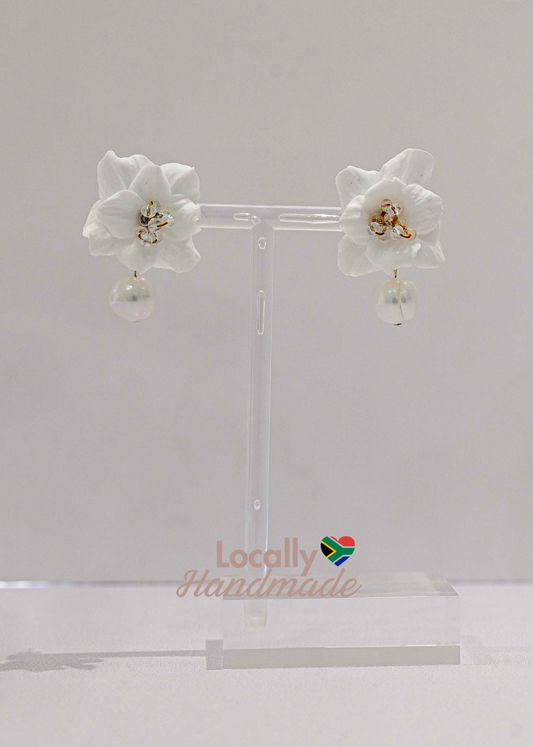 Clay flower bridal earring with a freshwater pearl