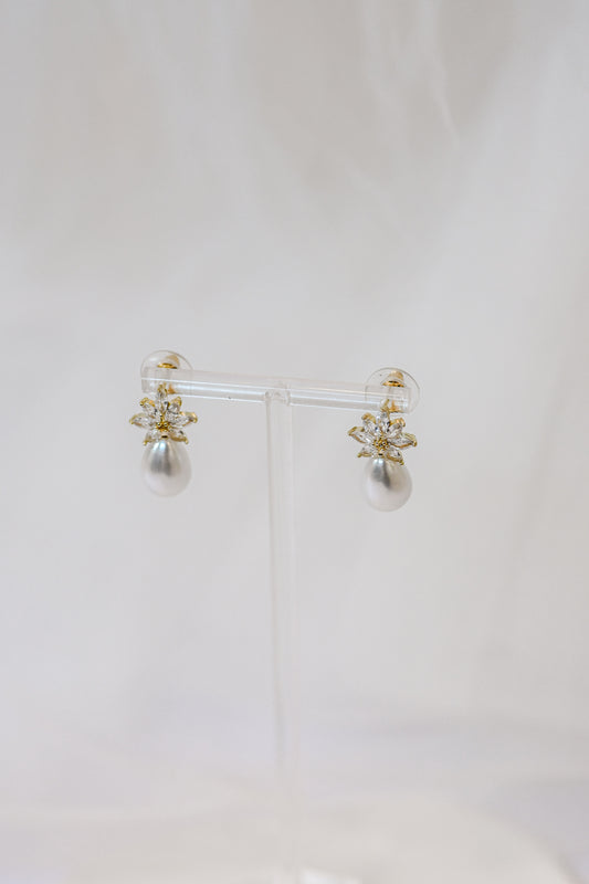 Gold cubic zirconia earrings with a teardrop pearl