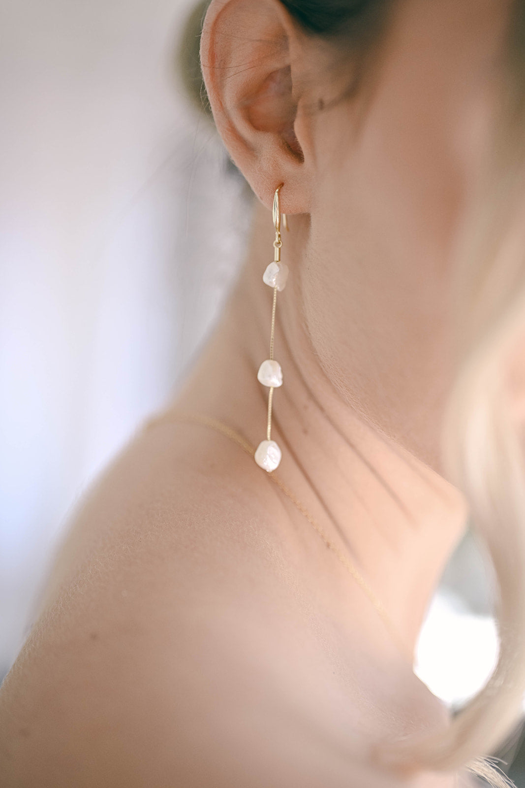 Bride wearing S925, gold plated hook earrings with 3 fresh water pearls