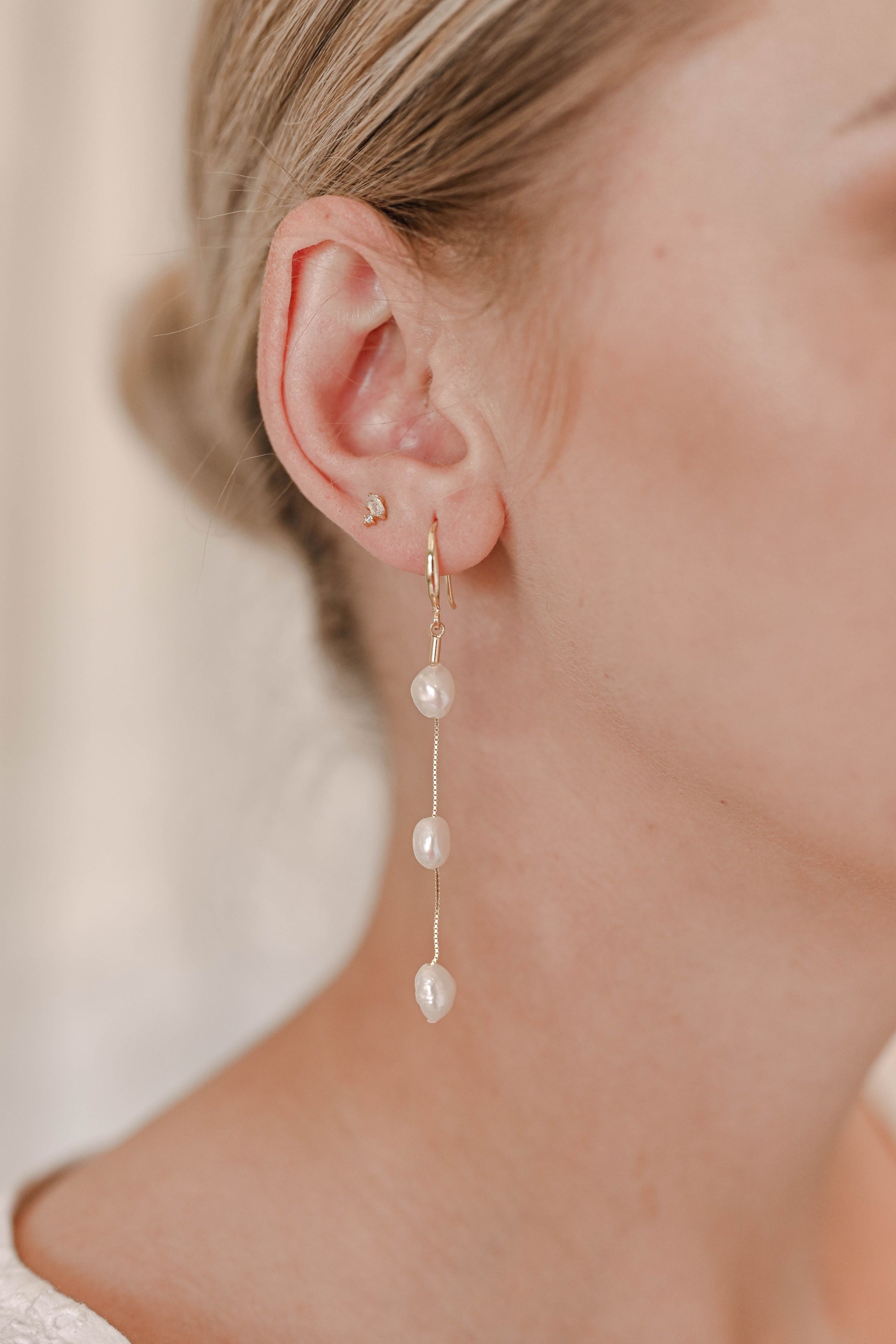 Bride wearing S925, gold plated hook earrings with 3 fresh water pearls