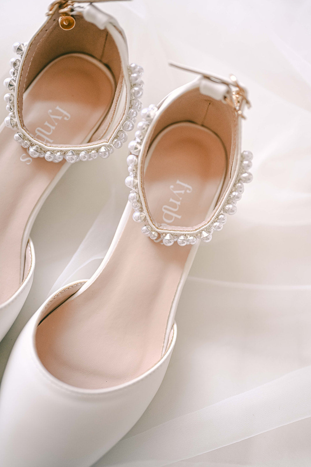 Ivory closed toe bridal block heel with pearl ankle strap