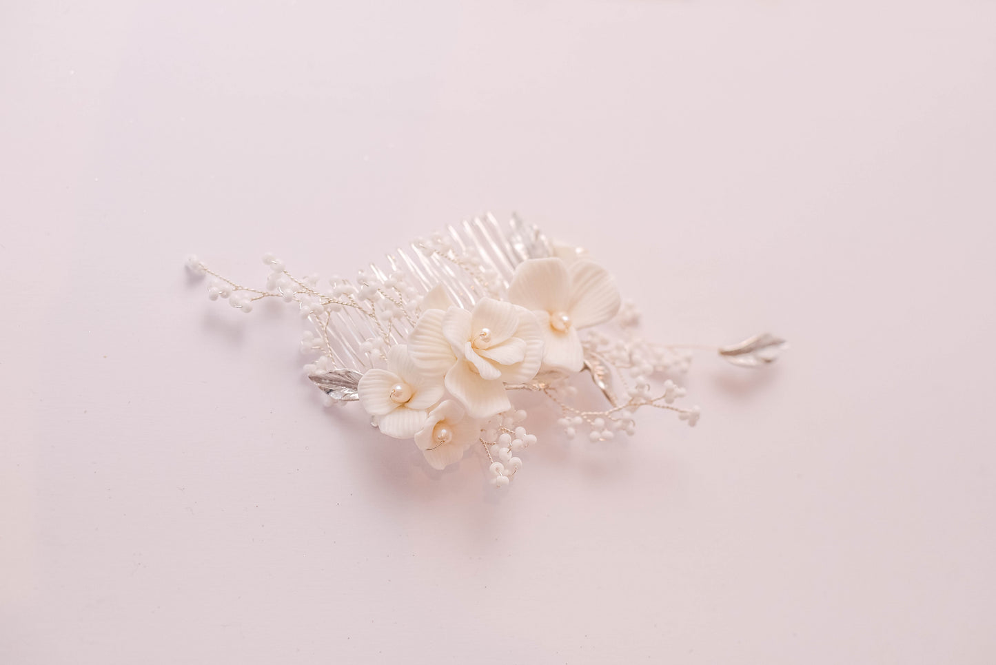 Silver bridal hair comb with porcelain flowers, fresh water pearls and beads
