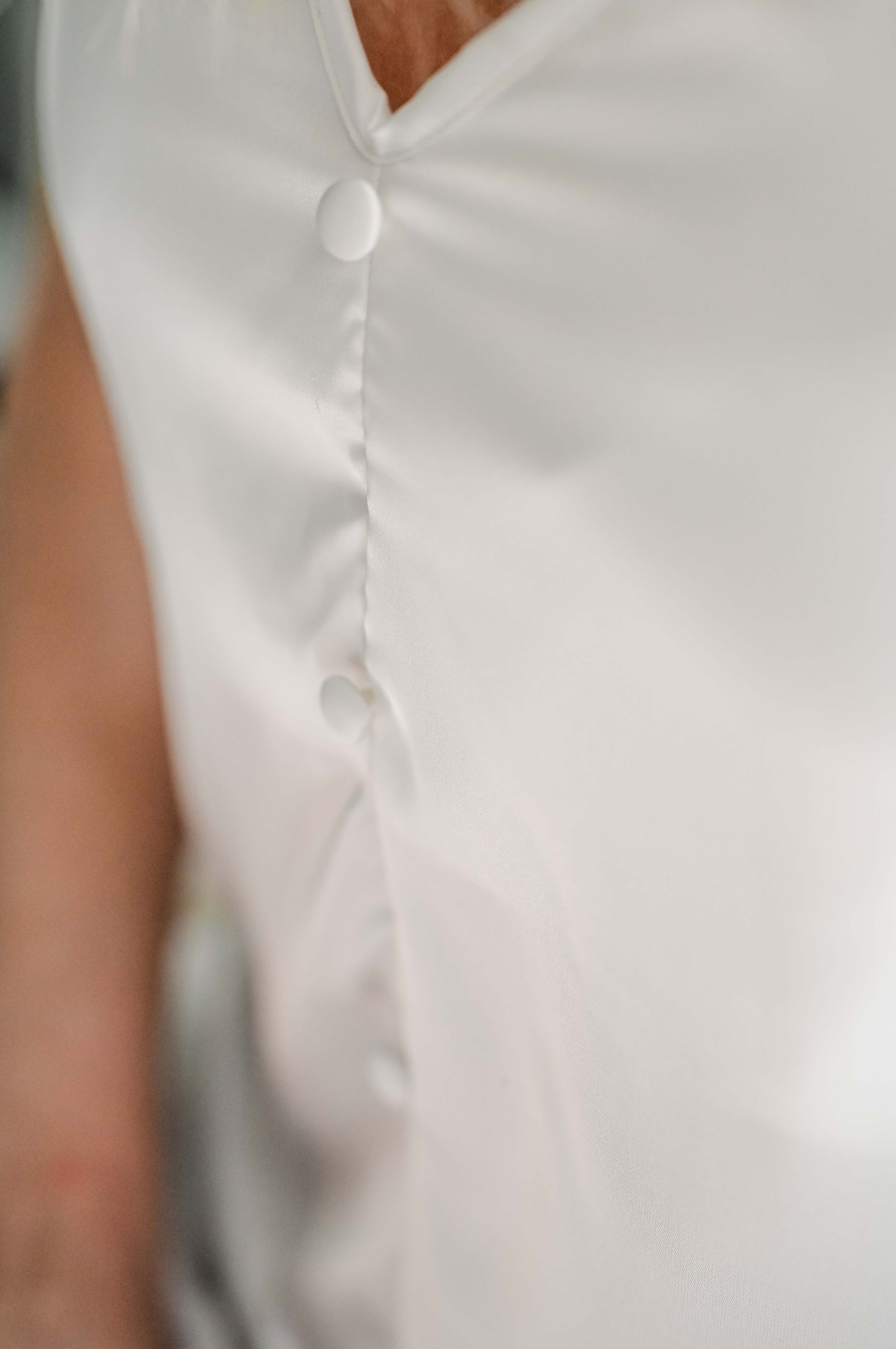 Bridal silk getting ready pajamas for the wedding morning. With beautiful frills on the shoulder and shorts