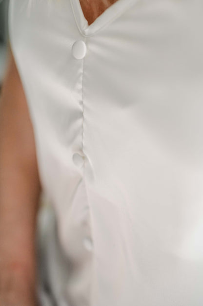 Bridal silk getting ready pajamas for the wedding morning. With beautiful frills on the shoulder and shorts