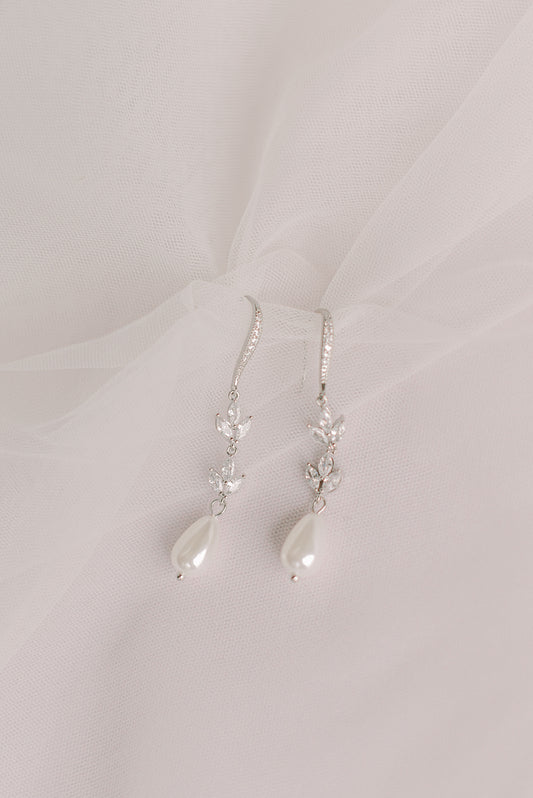 Silver dangling bridal earring with cubic zirconia and faux pearl