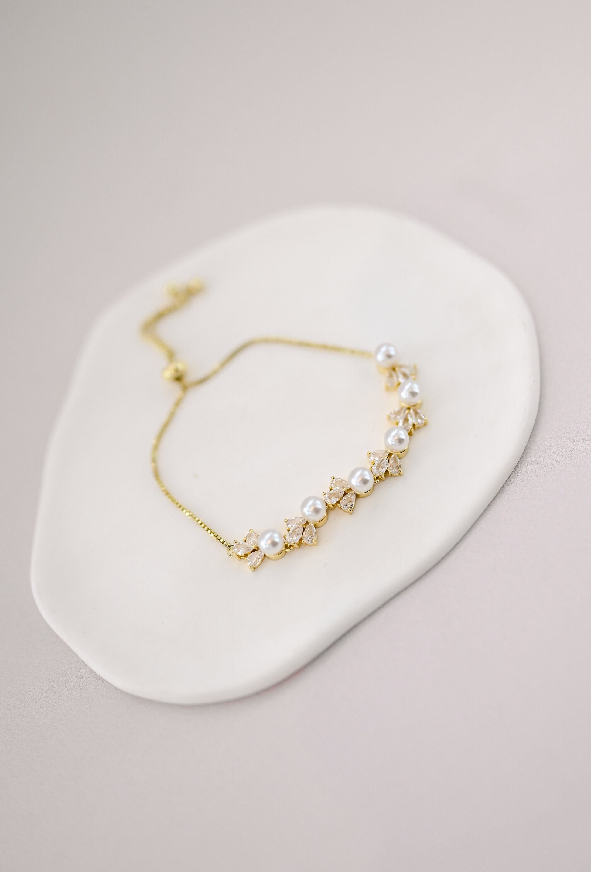 Adjustable gold bridal bracelet with pearls and cubic zirconia