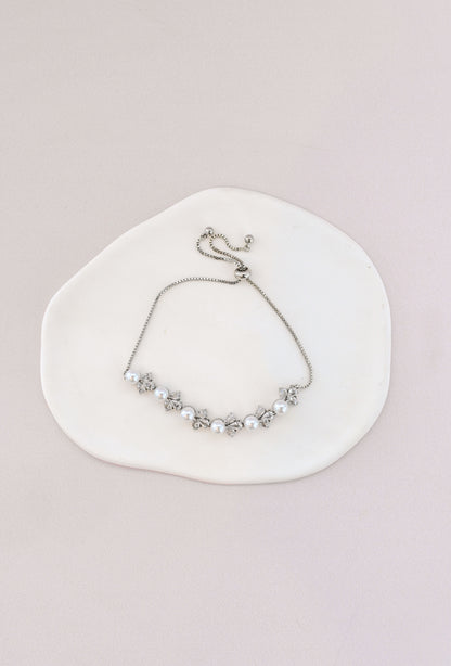 Adjustable silver bridal bracelet with pearls and cubic zirconia