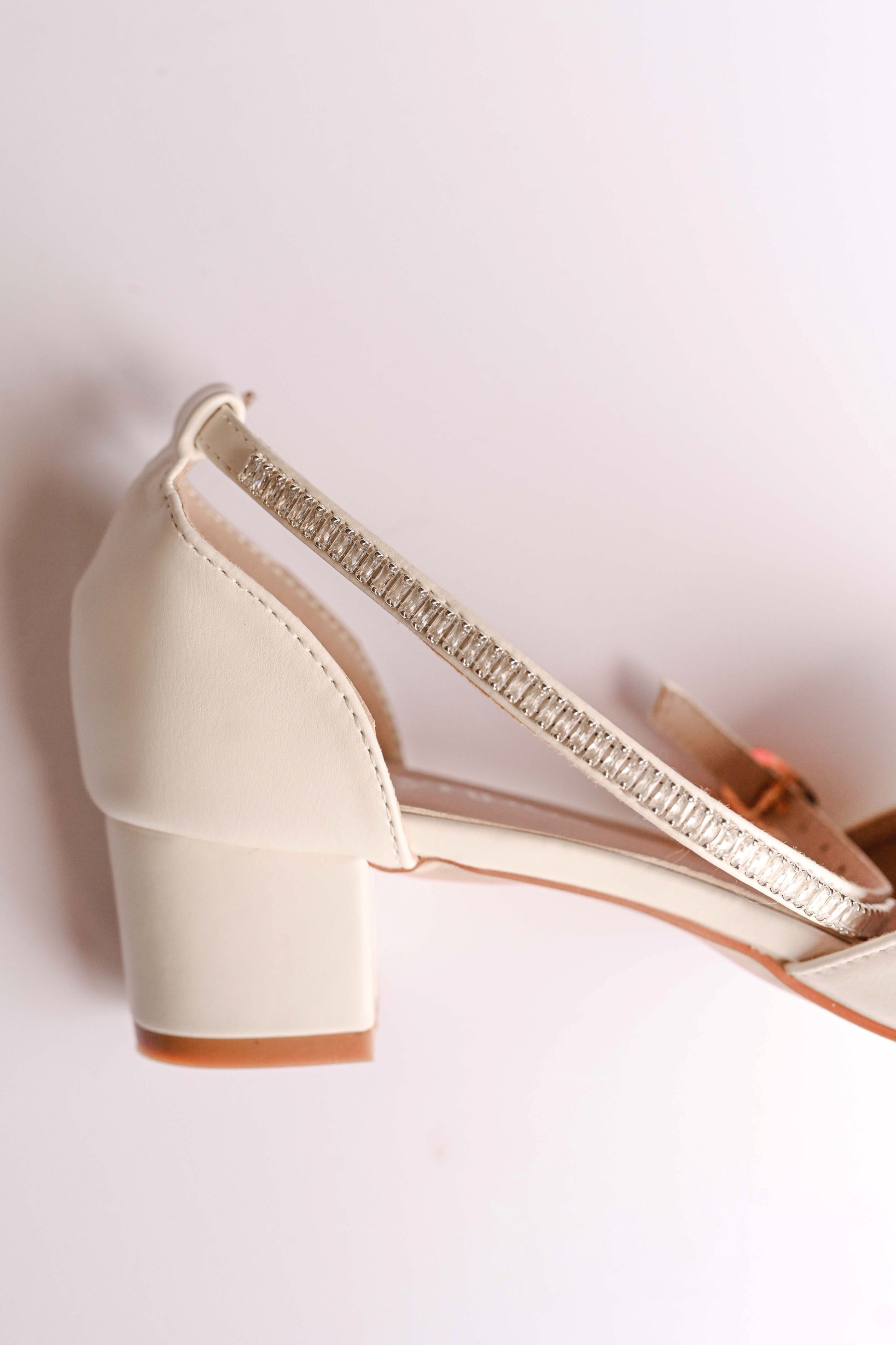 Ivory bridal block heel with open toe design and silver cubic zirconia embellished ankle strap