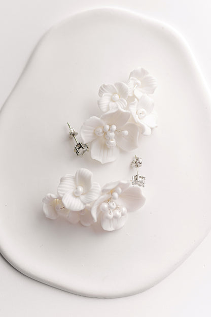 Silver bridal earrings with a cluster of porcelain flowers