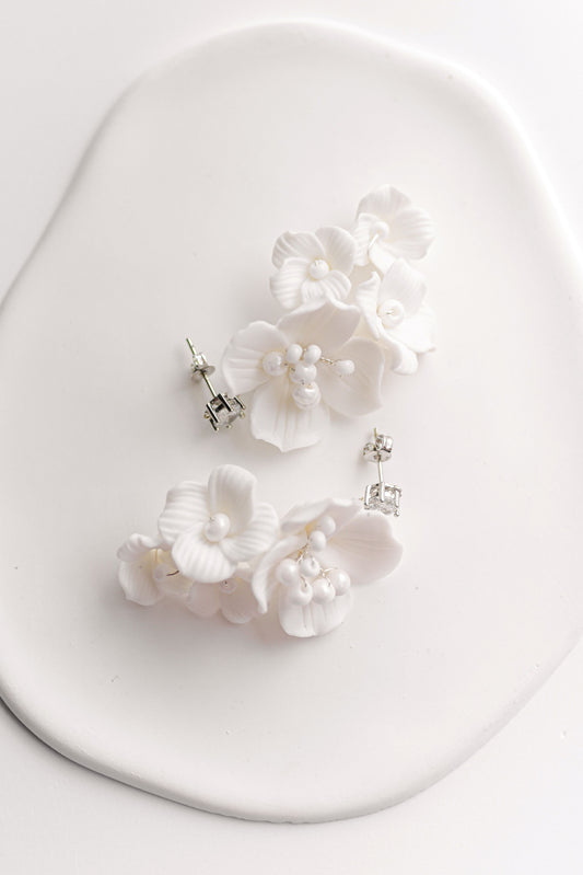 Silver bridal earrings with a cluster of porcelain flowers