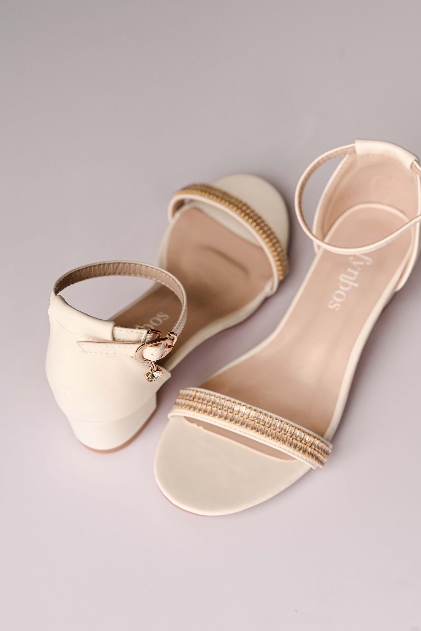 Ivory bridal block heel with gold cubic zirconia detail on toe strap