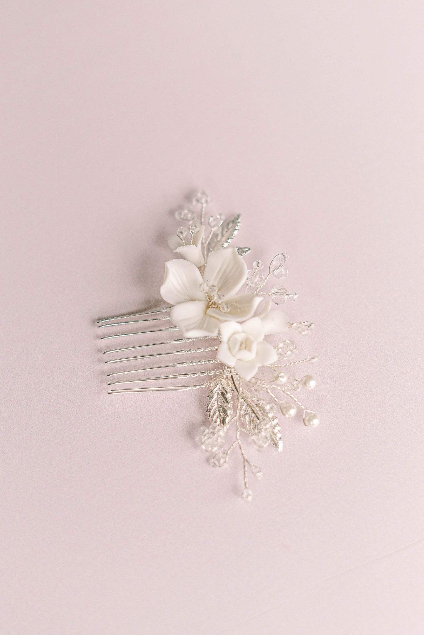 Silver bridal hair comb with porcelain flowers