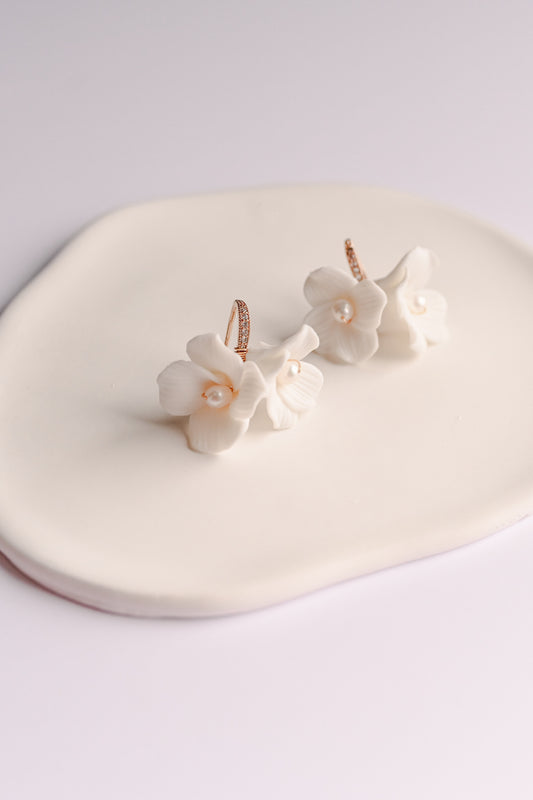 Rose Gold bridal earrings with two porcelain flowers and fresh water pearls