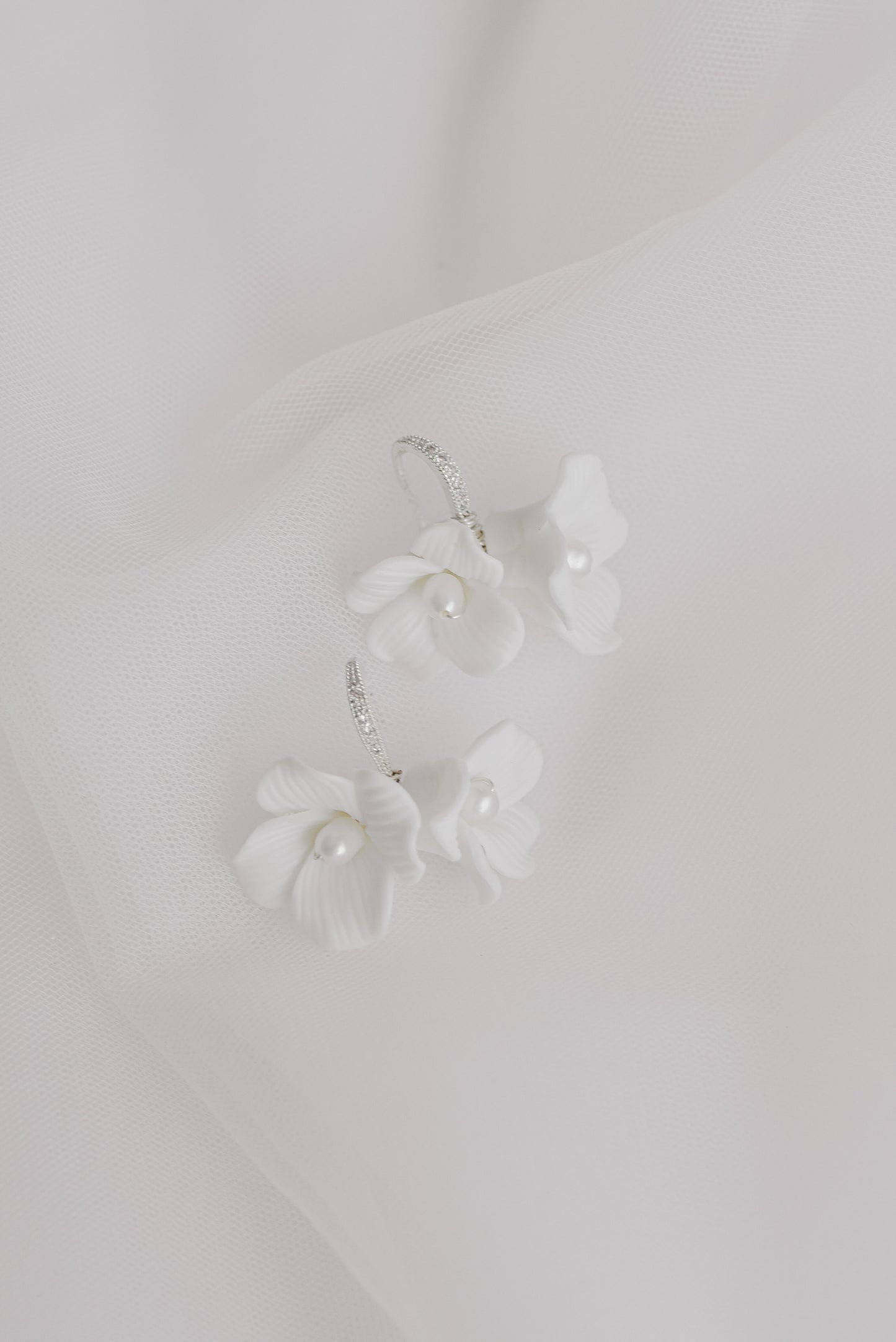 Silver bridal earrings with two porcelain flowers and fresh water pearls