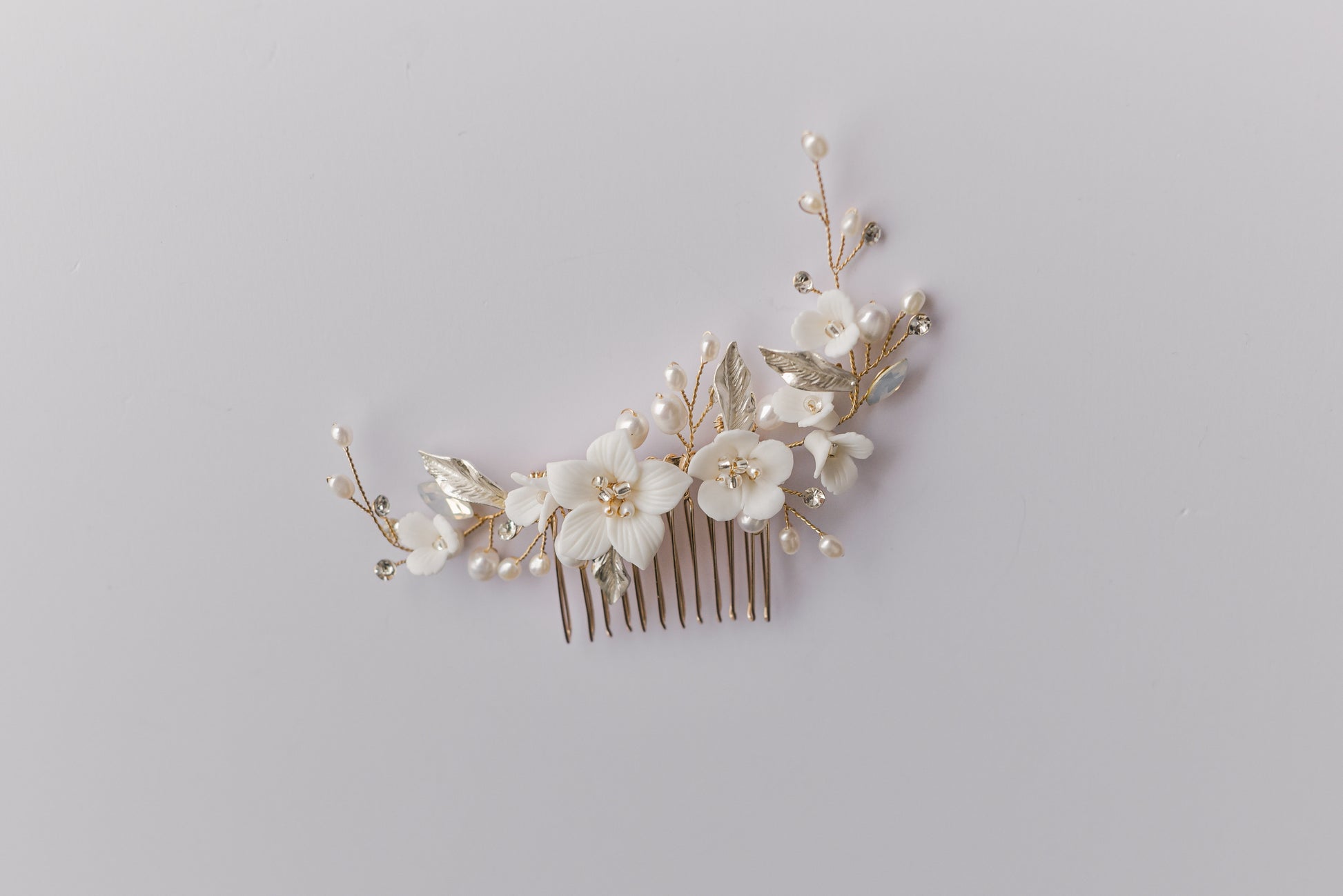 Bridal hair comb with porcelain flowers and fresh water pearls