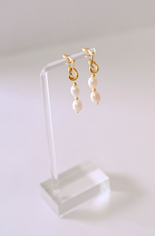Gold knot bridal earrings with two freshwater pearls.