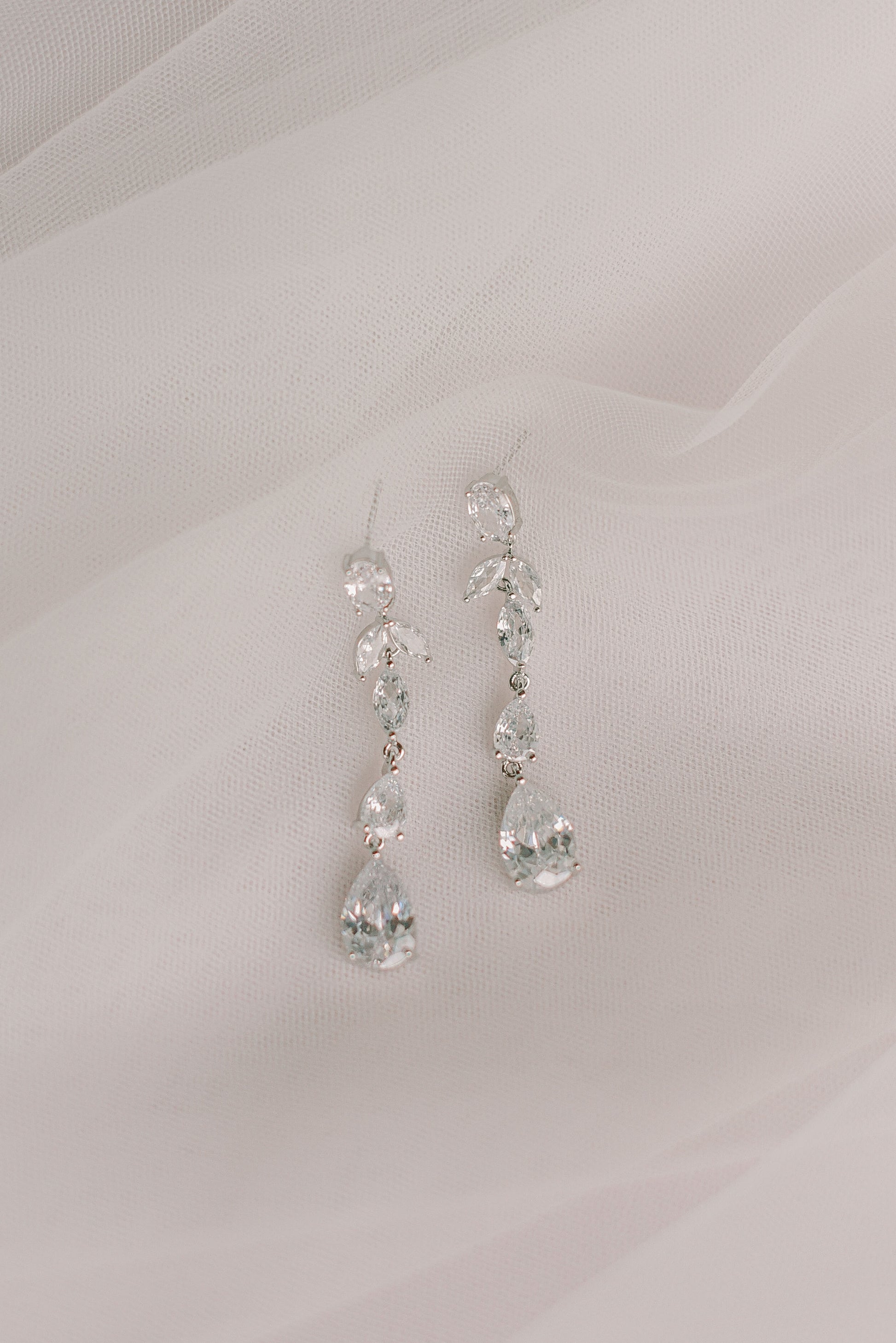 Silver dangling bridal earrings