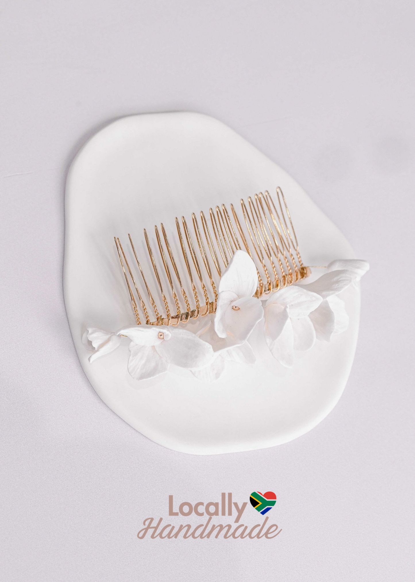 Gold bridal hair comb with handmade clay flowers