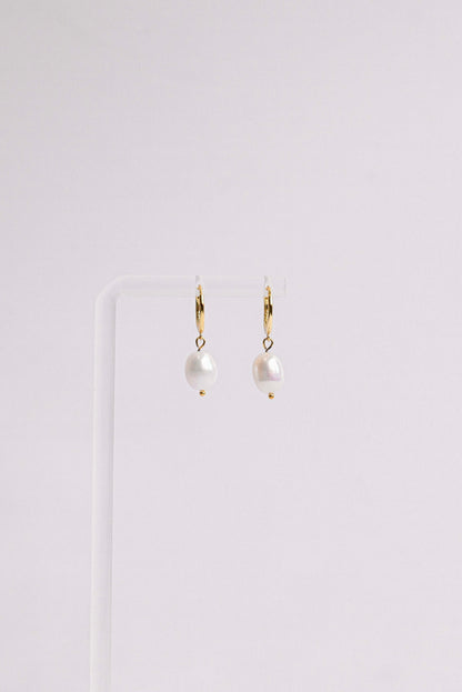 Sterling silver hoop earring with a freshwater pearl