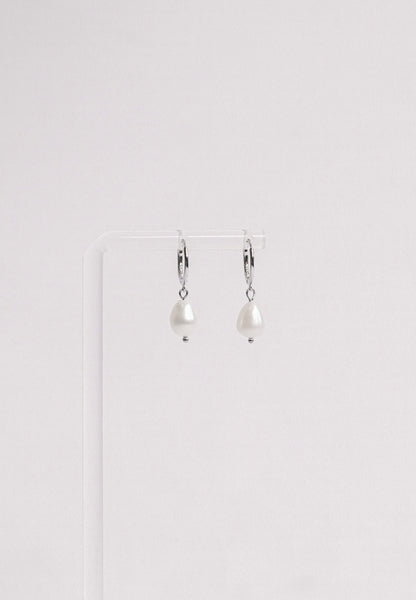 Sterling silver hoop earring with a freshwater pearl