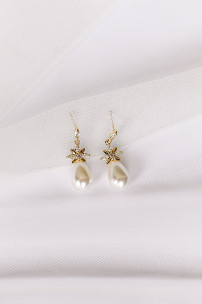 Gold bridal earrings with cubic zirconia and a faux pearl