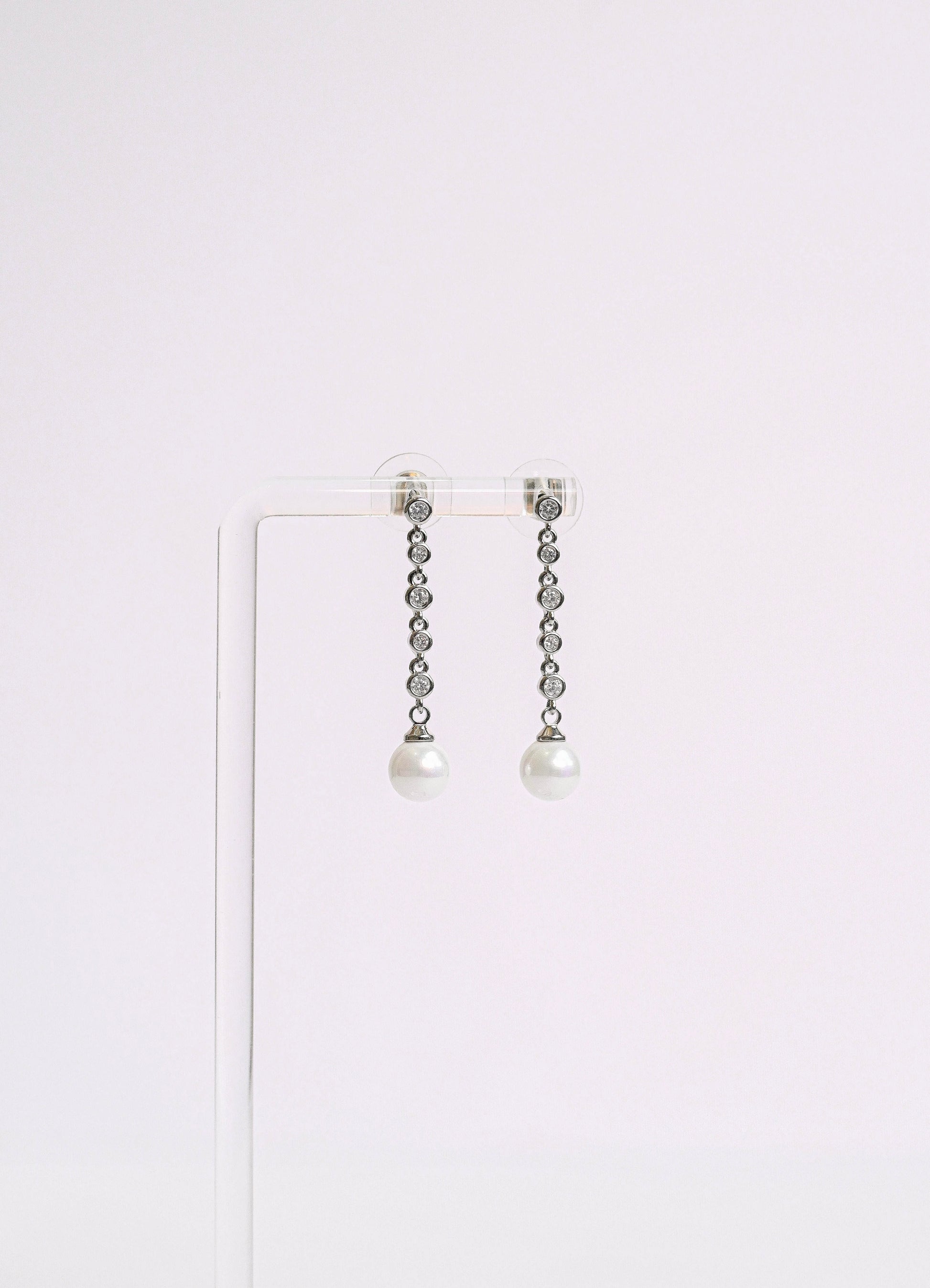Dainty cubic zirconia bridal drop earring with a faux pearl