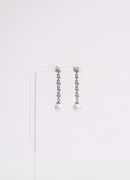 Dainty cubic zirconia bridal drop earring with a faux pearl