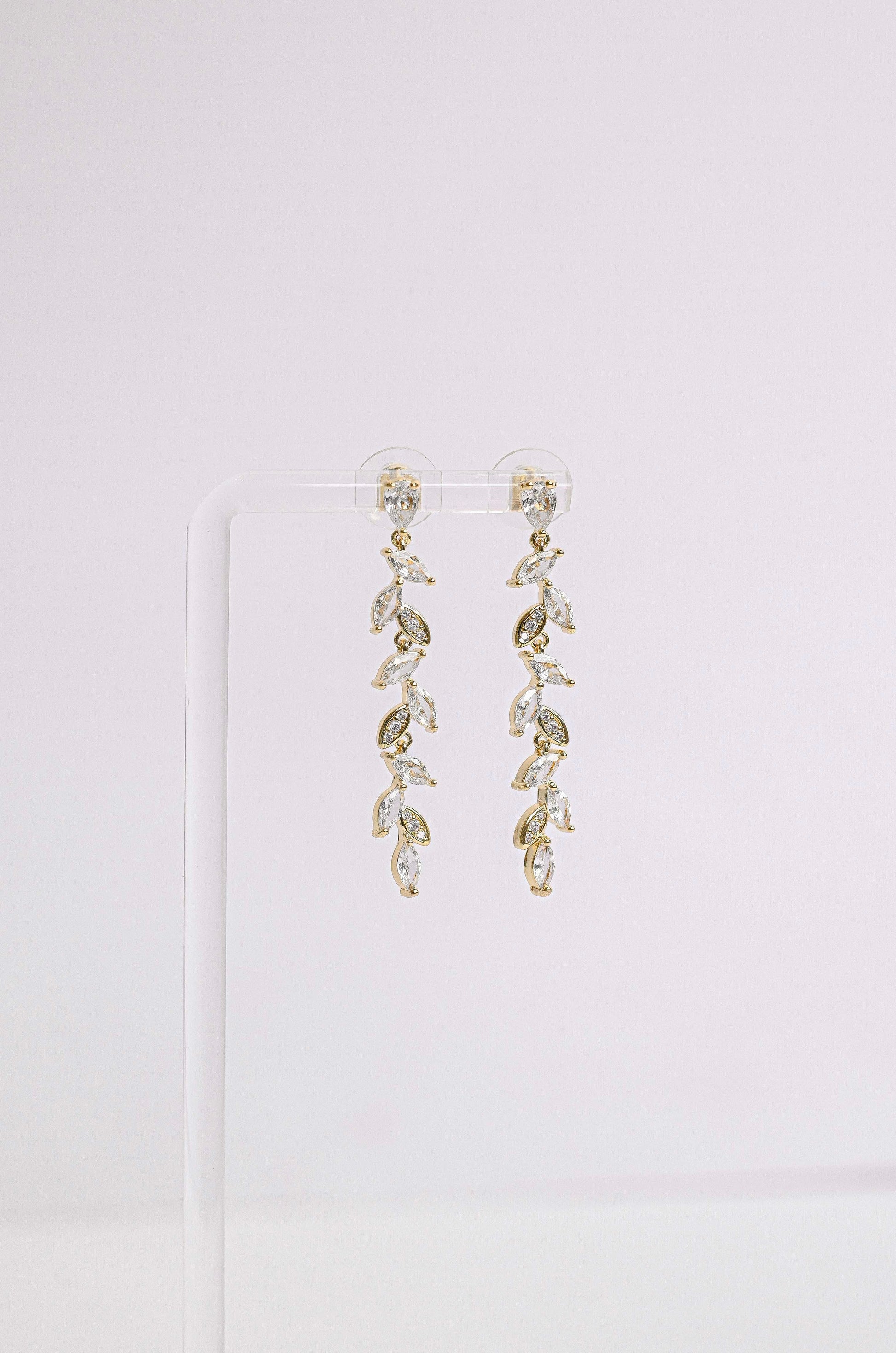 Dangling cubic zirconia bridal earring with leaf design
