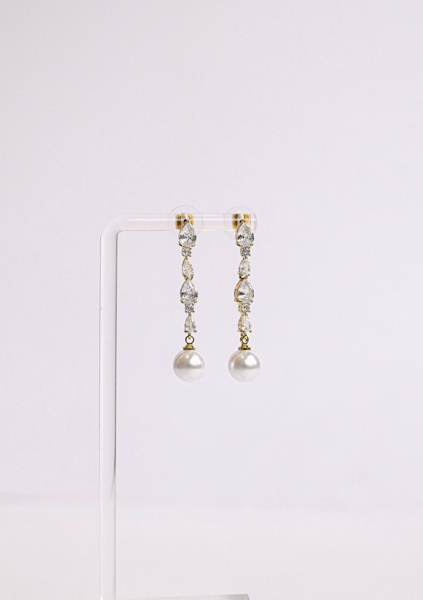 Cubic Zirconia bridal earring with a faux pearl