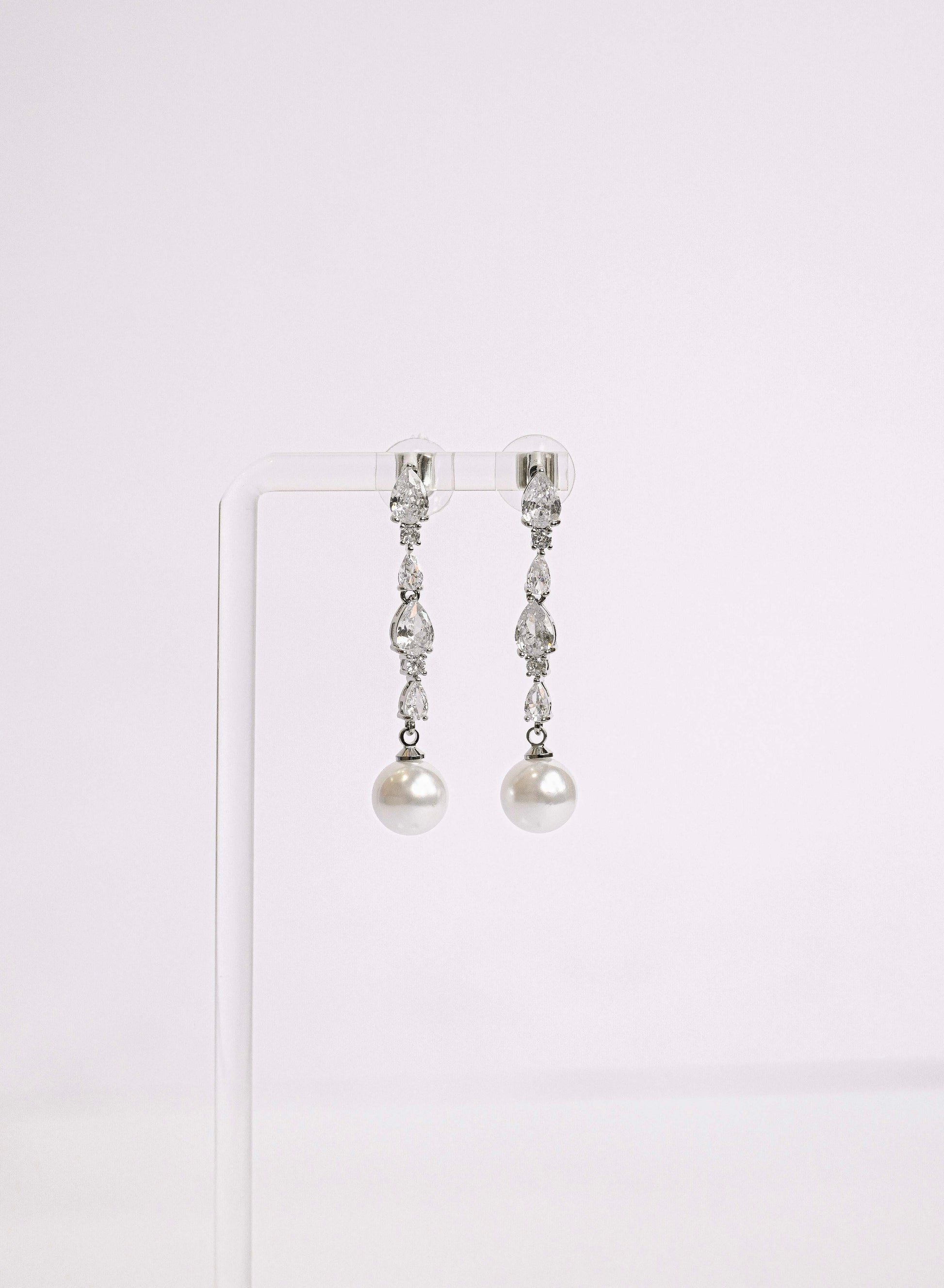Cubic Zirconia bridal earring with a faux pearl