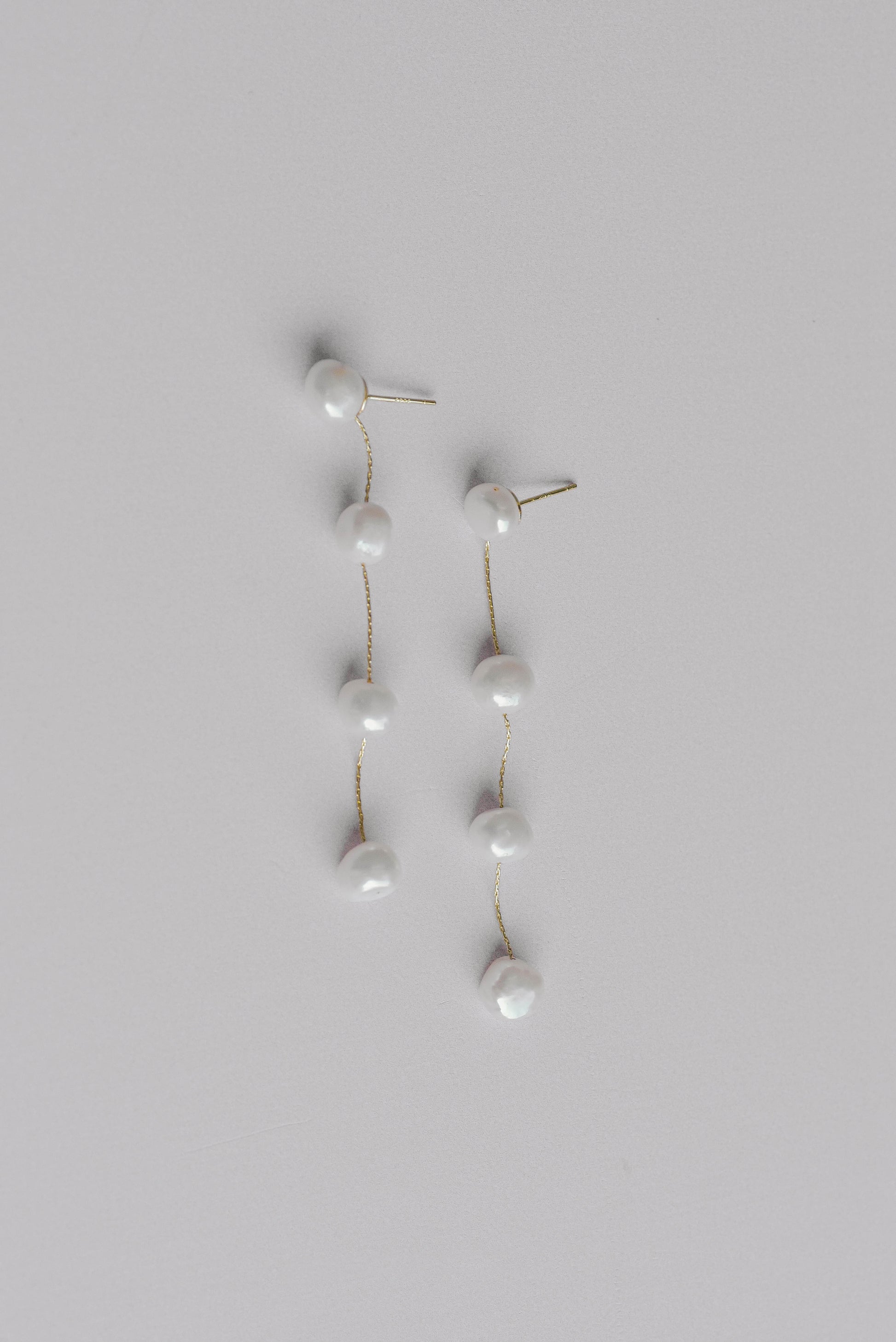 Gold string of 4 fresh water pearl bridal earrings
