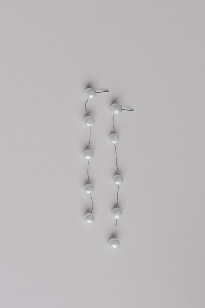 Silver string of 5 fresh water pearl earrings