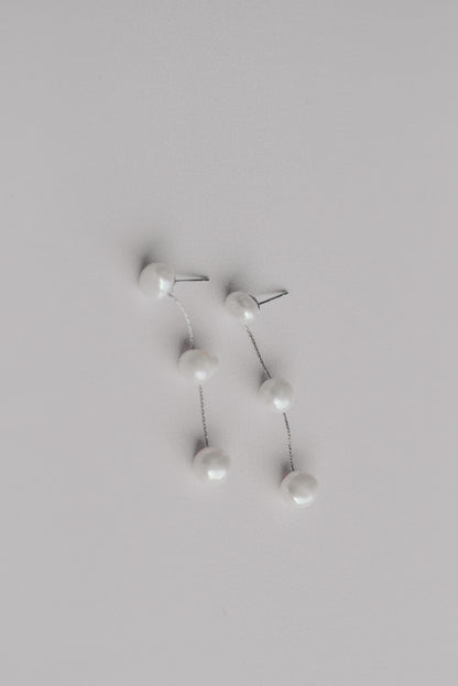 Silver bridal earrings with a string of 3 fresh water pearls