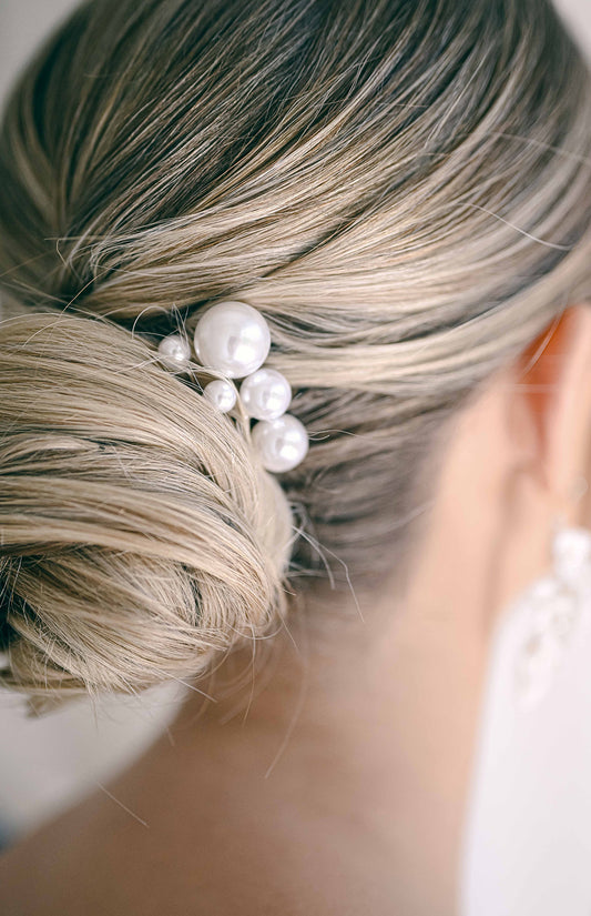 Pearl pins in a bridal bun